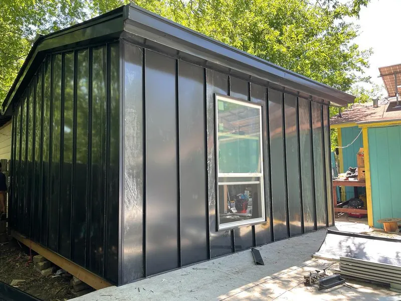 Black standing seam metal wall panels for Roof Inspection in Washingtonville