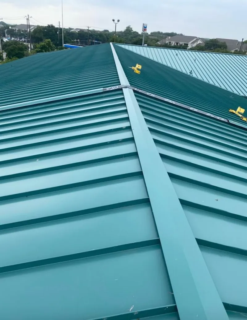Green commercial metal roof ridge and valley for Metal Roof Repair in Washingtonville